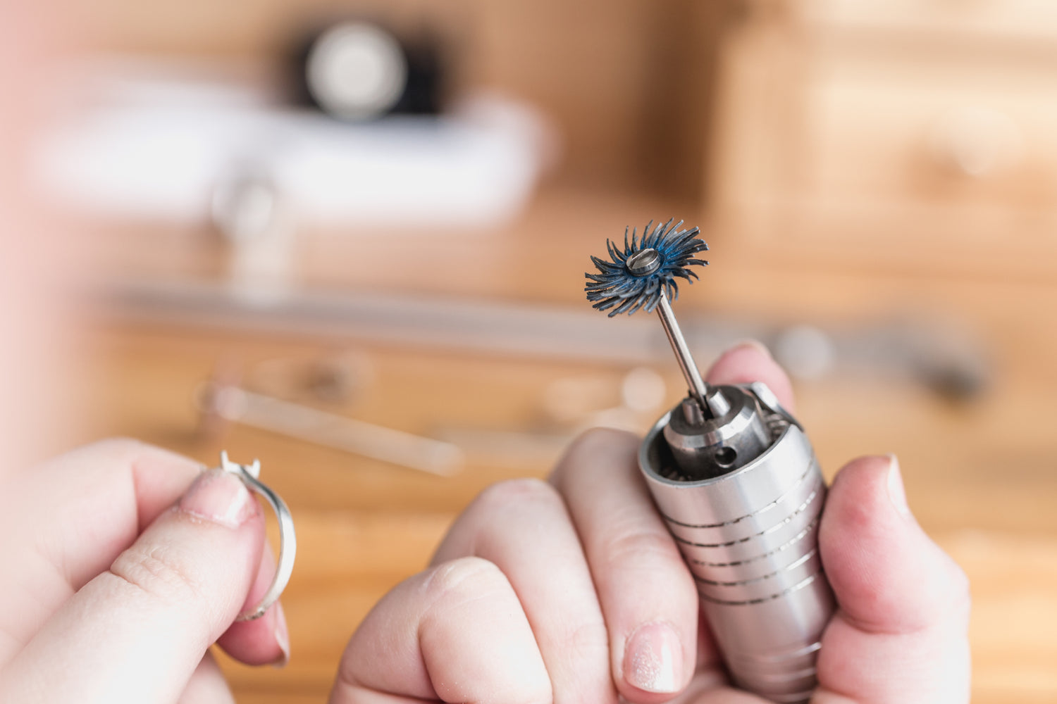 a jeweller preparing to finish a ring